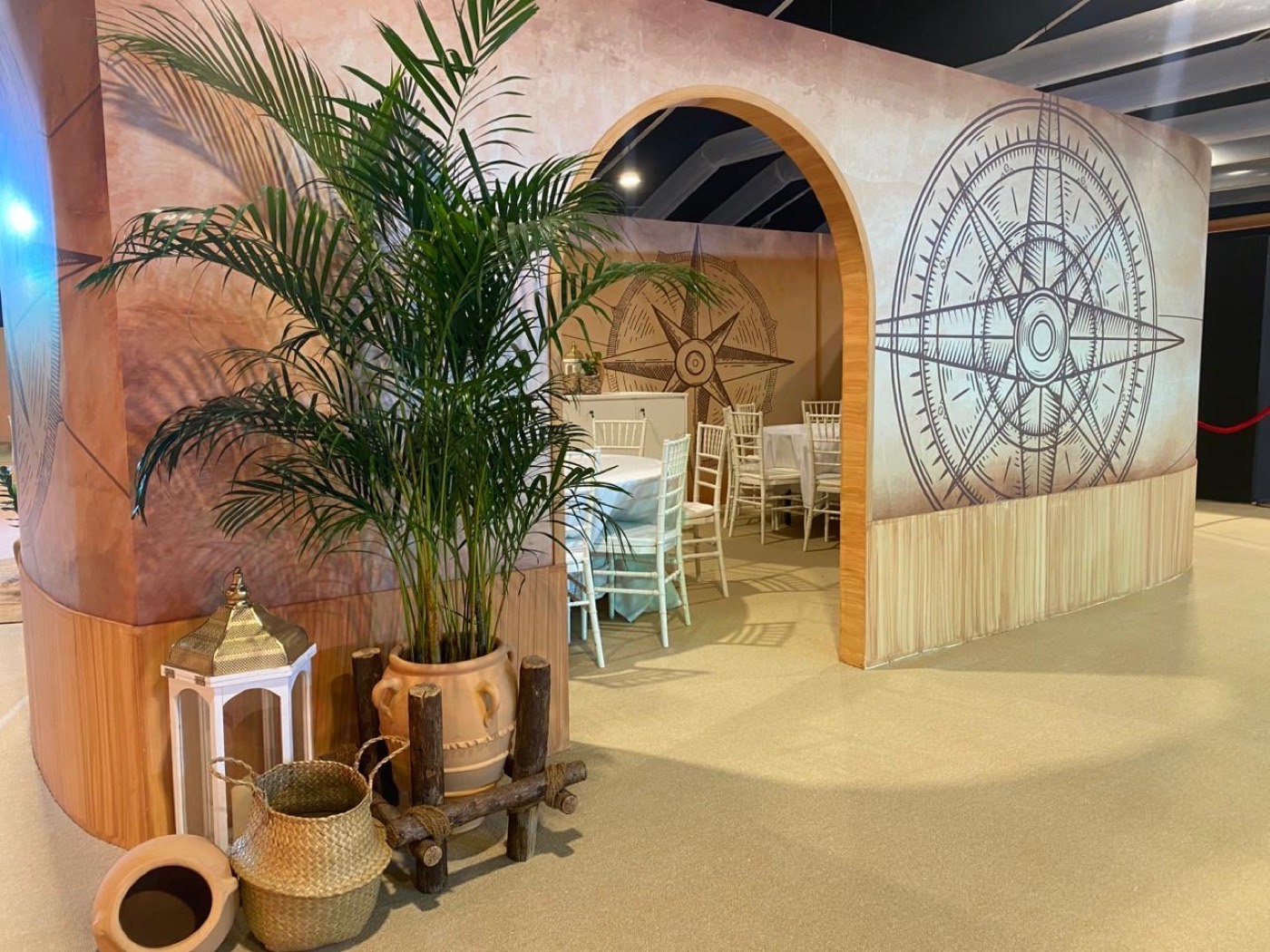 SINF 2025 compass arch entrance with hand-drawn Ibn Battuta navigation motif